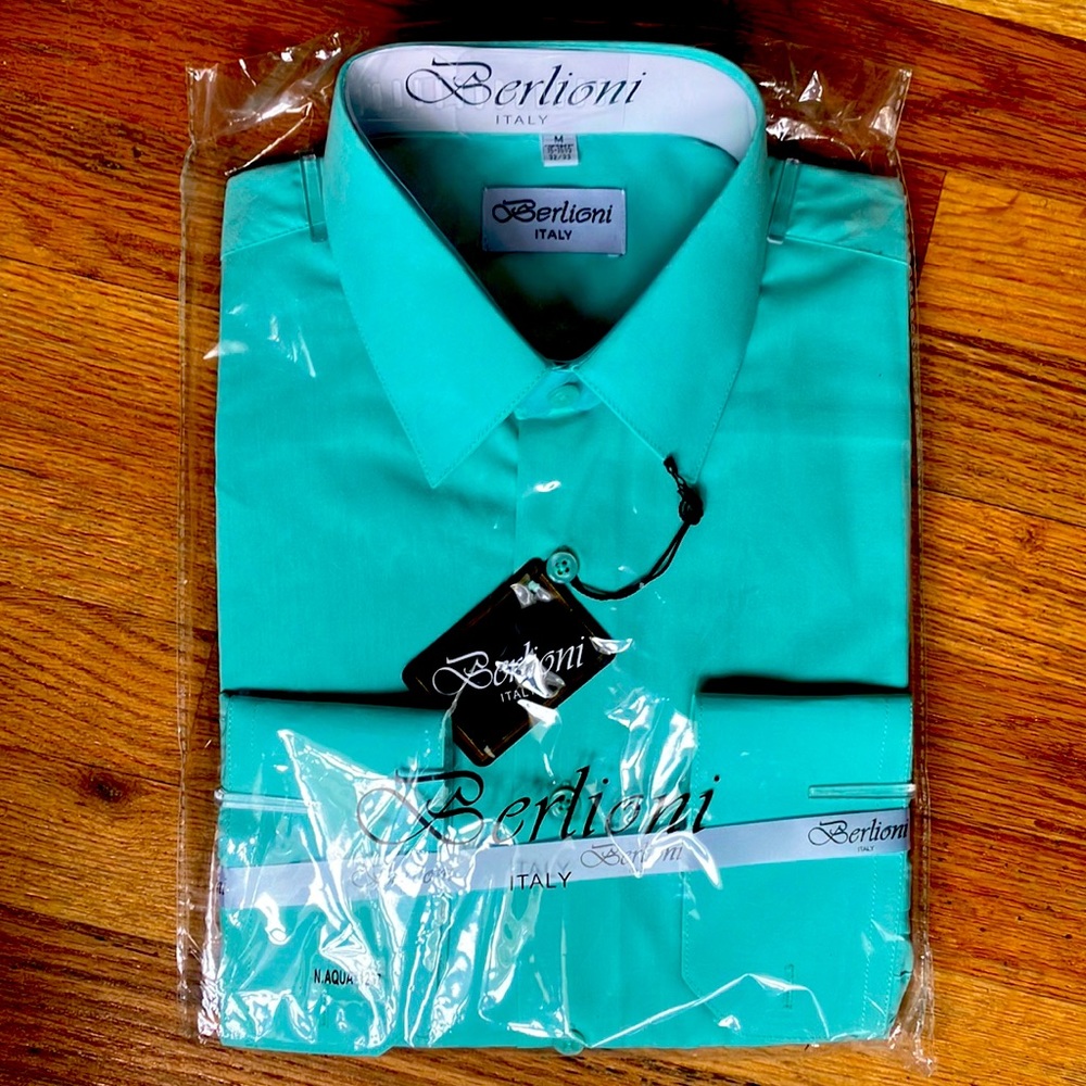 Aqua green long sleeve dress shirt.Brand: Berlioni Italy. Size is a medium 32-33